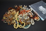 Bag Full of Assorted Costume Jewelry