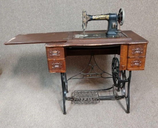 Antique white rotary pedal sewing machine