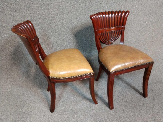 Two Maitland-Smith leather game chairs
