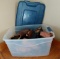 Plastic Tote Full of Mens Shoes And Boots