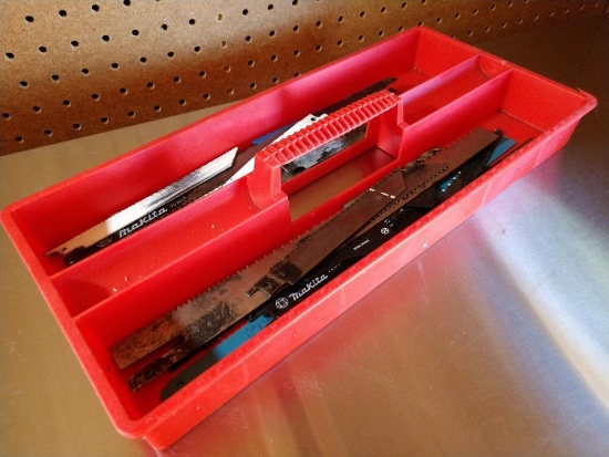 Plastic Tool Box Full of Saw Blades