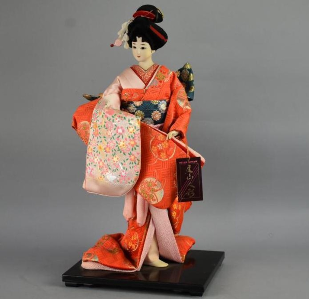 porcelain geisha doll