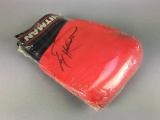 Vintage Autographed Hitman Boxing Glove