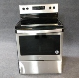 Stainless Steel And Black Whirlpool Electric Range Top Oven