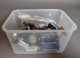 Plastic Tote Full of Batteries