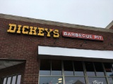 2 - outdoor lighted Dickey’s Barbecue Pit signs; outside.