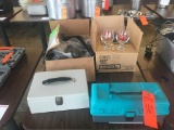 First Aid Kit; cash box; wall rack & glasses.