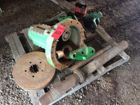 Pallet of John Deere 4650 tractor parts. (includes planetary parts; brake discs & axle shaft.)