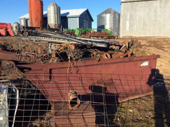 Dumpster w/ scrap iron.