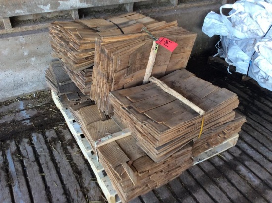 Pallet w/ 8 bundles of cedar shingles.