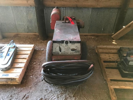 Lincoln portable welder; 16 hp gas engine; 225 amp AC/DC welder; 110/220 generator; s/n A990675.