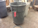 Rubbermaid waste cans on casters.