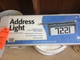 Personalized license plate covers; address light.