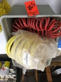 Coiled airline hose.