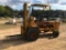 Harlo rough terrain forklift; 4-cylinder gas engine; approx. 15ft lift; gear shift.