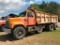 (TITLE) 1992 IHC 2554 tri axle dump truck; DT466 diesel; 8 speed trans; Heil 15ft double lined box;