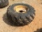 Goodyear 19.5L x 24 tire on 8-hole rim.