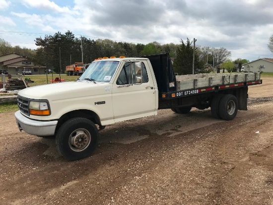 (TITLE) 1994 Ford Super Duty flatbed truck; 2x4; 7.3L diesel engine; auto; DRW; 14ft stake rack;