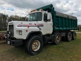 (TITLE) 1993 Mack DM 690S tri-axle dump truck; Mack EM7-300 engine; Maxi Torque T2070 7-speed trans;