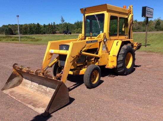 1980 John Deere 410 loader backhoe; cab w/ heat; 2 x 4; standard hoe; 5,027 hours; s/n 349335T.