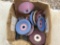 Box of grinding wheels.