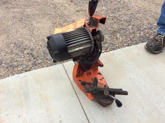 E Mak chain saw sharpener.