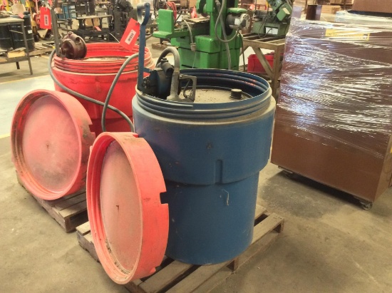 Blue 55-gallon drum containment w/ drum & hand pump.