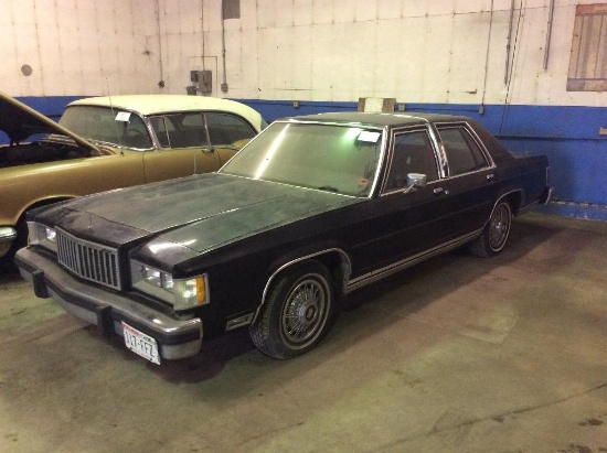 1985 Mercury Grand Marquis 4-door sedan; Landau roof; 21,805 miles; s/n 2MEBP95F4FX675493.