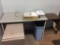 2-Typewriter tables; table; bookshelf; lamp.