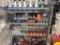Lot of Assorted Red Line & misc. oil w/ rack.