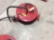 Lincoln retractable hose reel w/ hose.