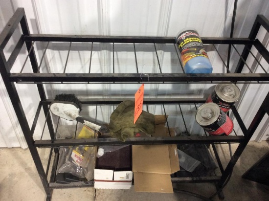 Rack w/ misc. tire supplies.