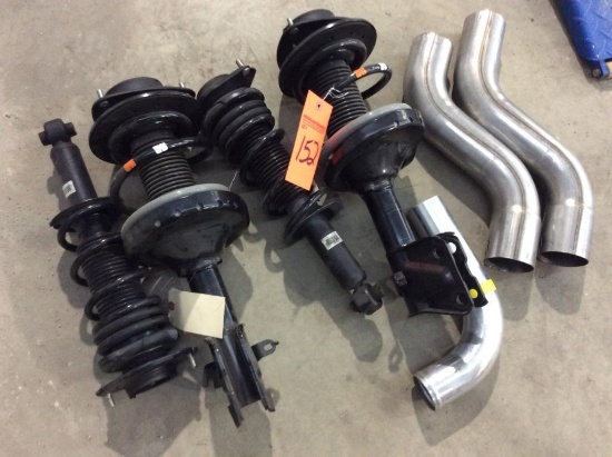 2016 Subaru STI stock coilovers.