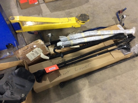 Assorted Ford Mustang parts.