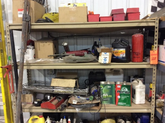 Metal rack w/ misc. contents.