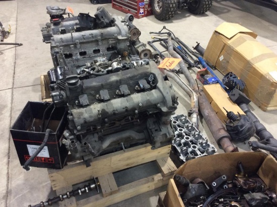 Lot of scrap engines & car parts.