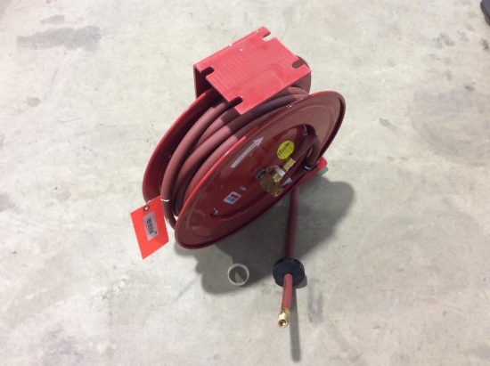 Lincoln retractable hose reel w/ hose.
