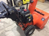 Ariens Deluxe 27 snow blower; 11 1/2 hp.