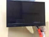 Visio flat panel TV w/ wall bracket.