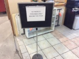 Sign on stand.