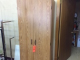 2-door wood cabinet.