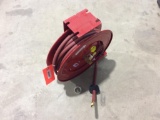 Lincoln retractable hose reel w/ hose.
