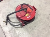 Lincoln retractable hose reel w/ hose.