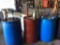 Red barrel w/ hand pump w/ Mobile 15W-40 diesel engine oil.