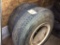2 - used 8.25R 15 trailer tires on rims.
