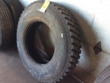 Bridgestone 11R 22.5 tire; (New Recap).
