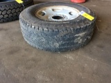 Used Firestone 265/70R 17 tire w/ 8-hole rim.