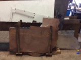 Misc. pieces of metal & steel stock in barrel & on rack.