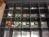 4 - drawers of copper lugs, battery terminals, shrink tube, nylon terminals.