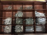 4-drawers of cotter pins, air brake fittings, nuts, C-rings.